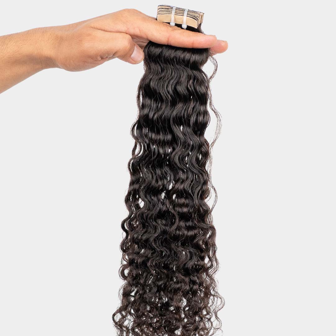 Tight curly tape-in hair extensions