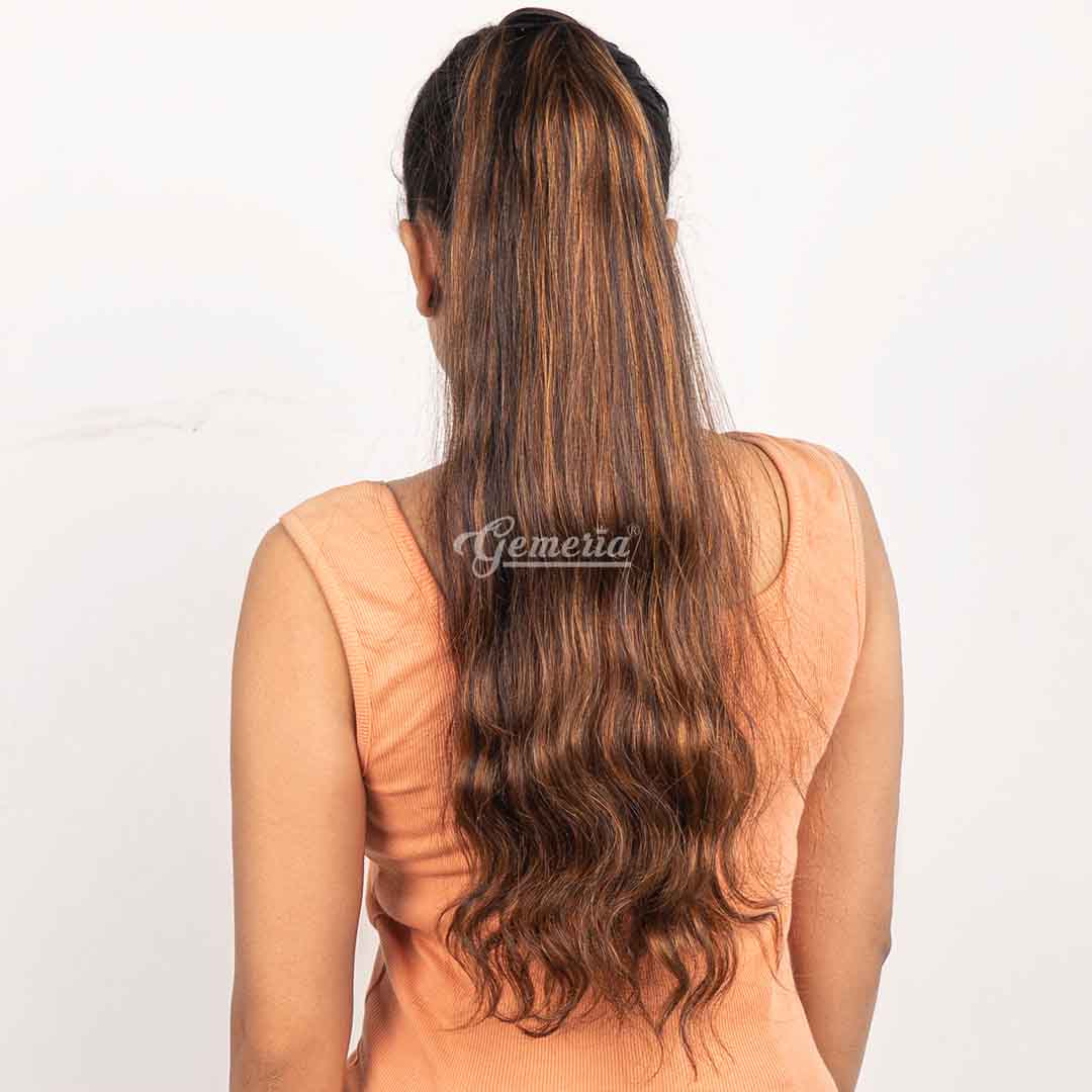 Caramel brown balayage ponytail extension back look